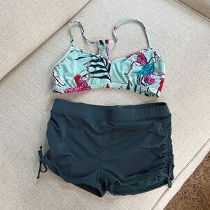 Carve Two Piece. Medium top and small bottom. Worn once!